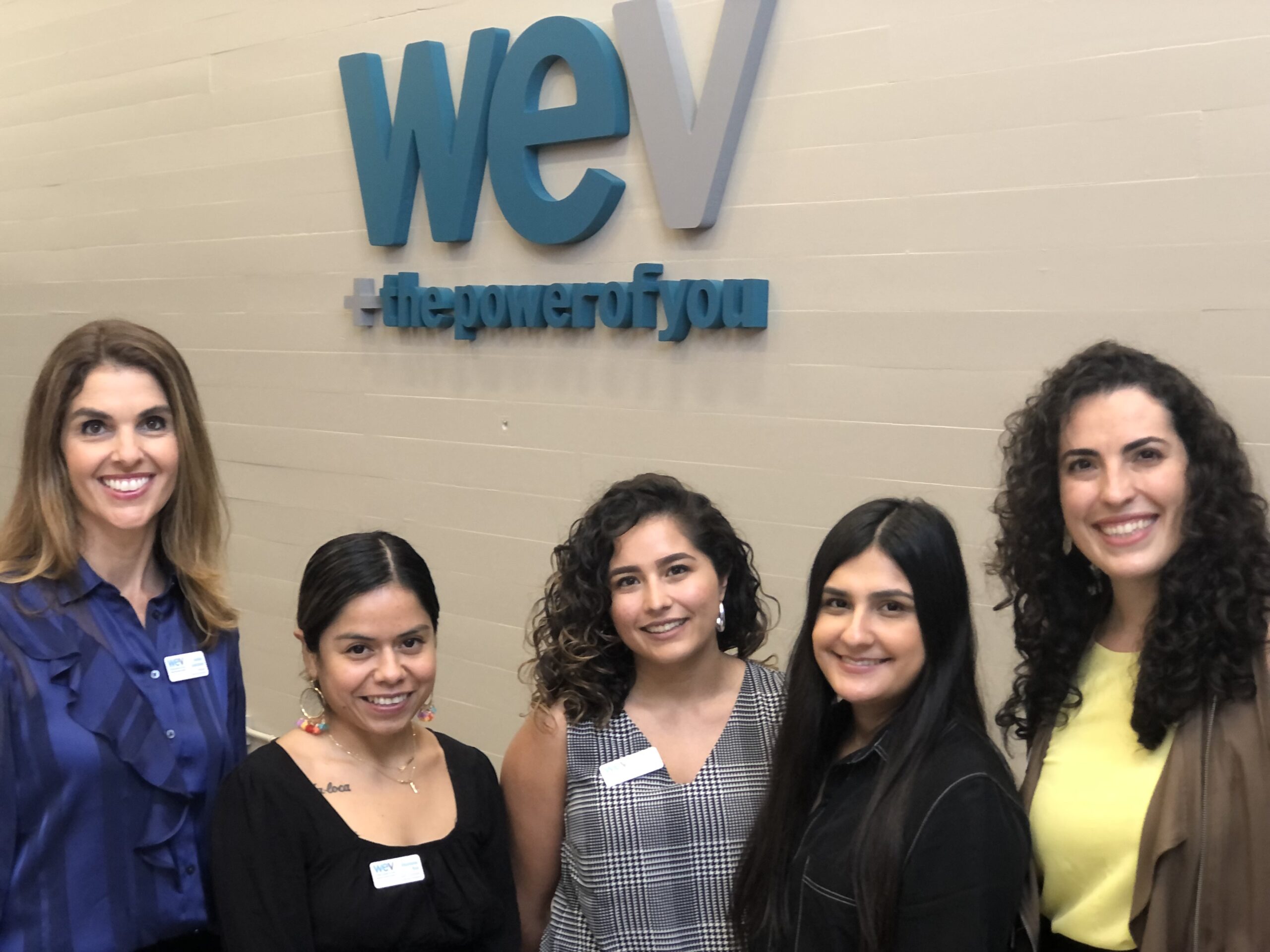 WEV staff members gather for the open house.