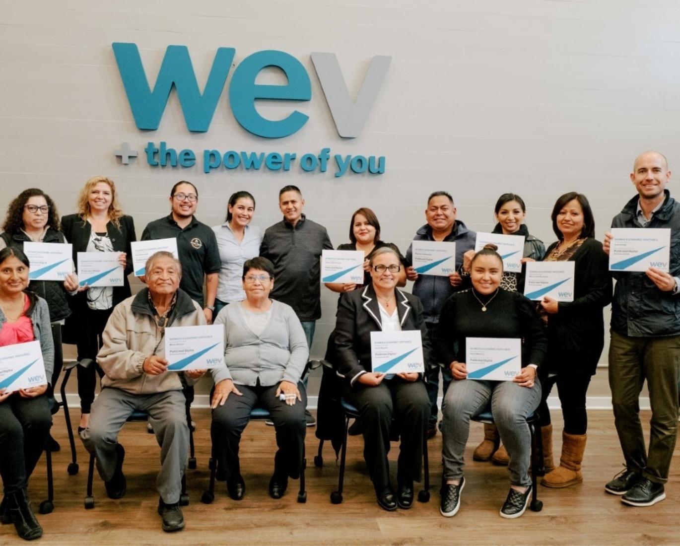 Business owners graduating from WEV's Spanish-language Digital Marketing class, with instructor Miguel Alfaro.